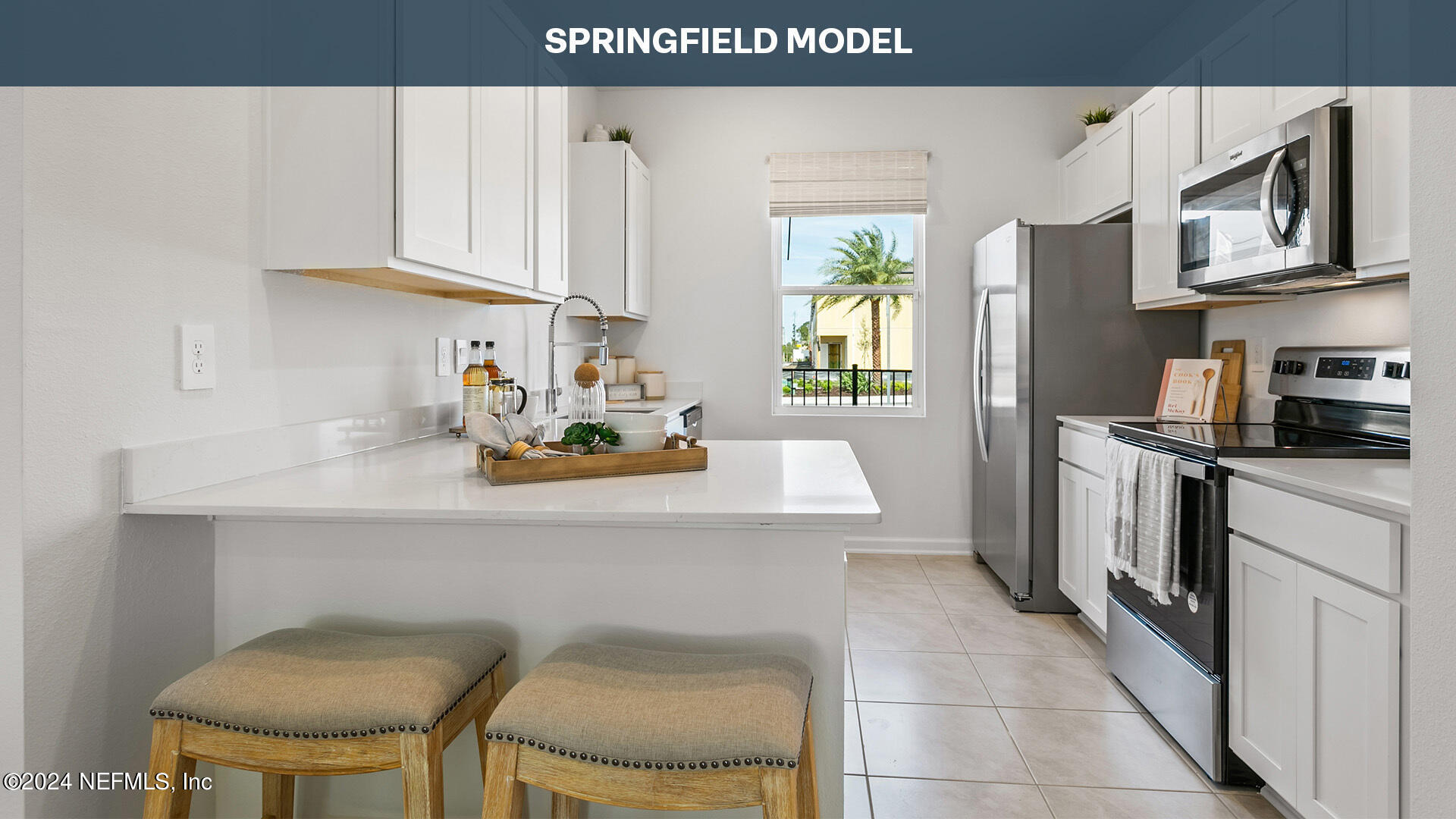 a kitchen with a sink cabinets and window