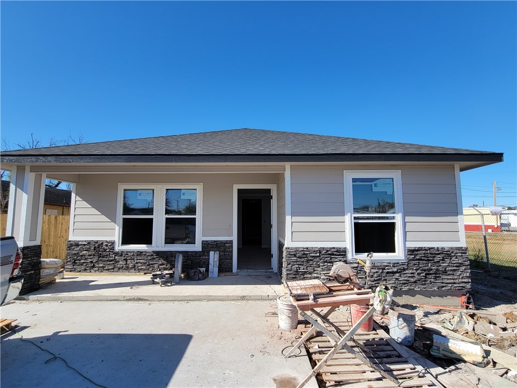 front view of a house with a patio