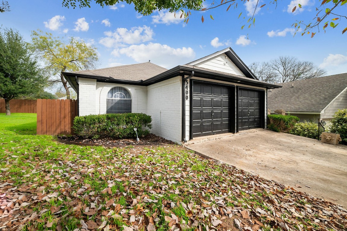 a house with yard in front of it