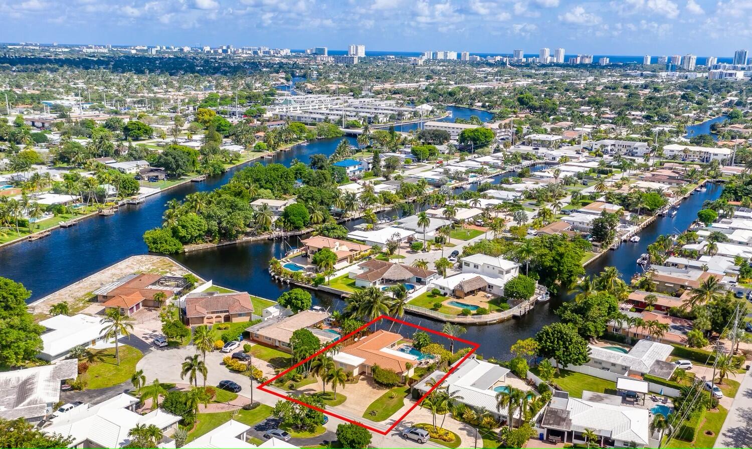 an aerial view of lake and city