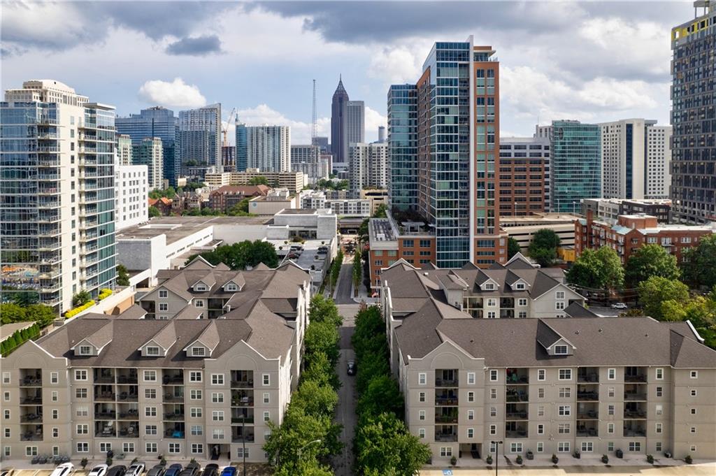 a view of city with tall buildings