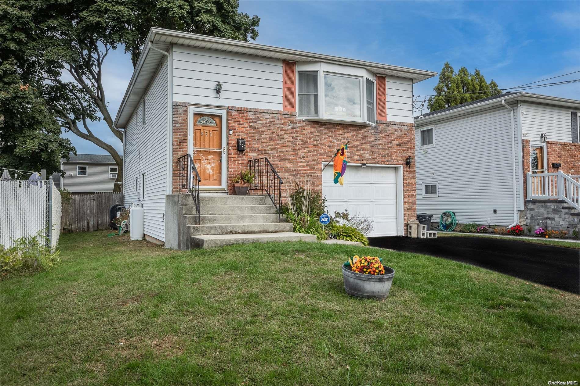 a house view with a garden space