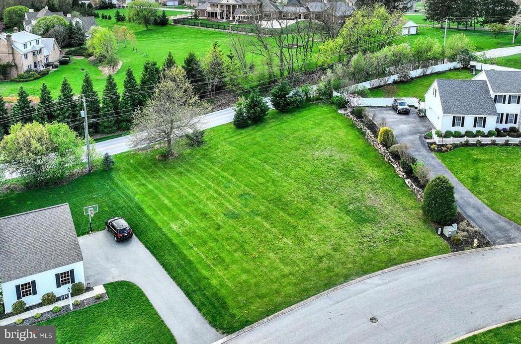 a aerial view of a house with garden