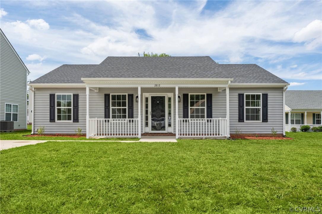 front view of a house with a yard