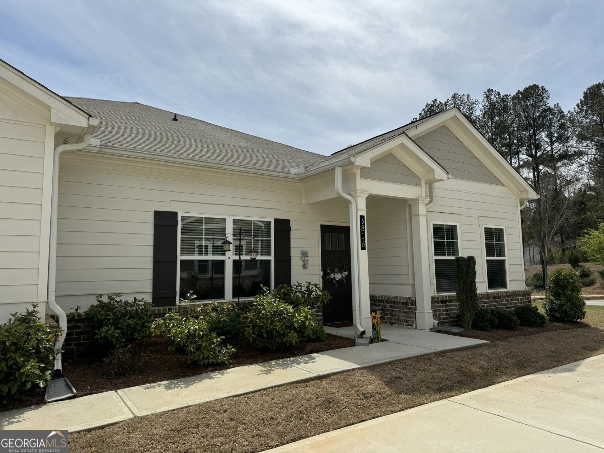 front view of a house and a yard