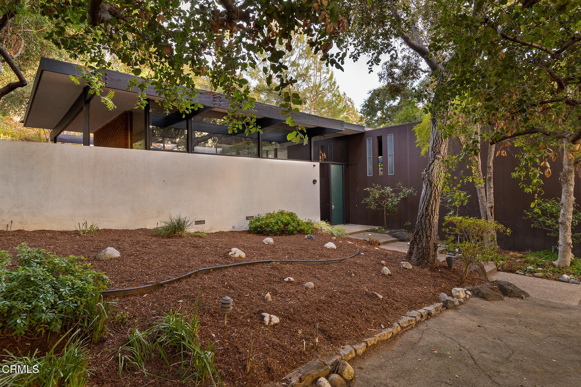 a backyard of a house with lots of green space