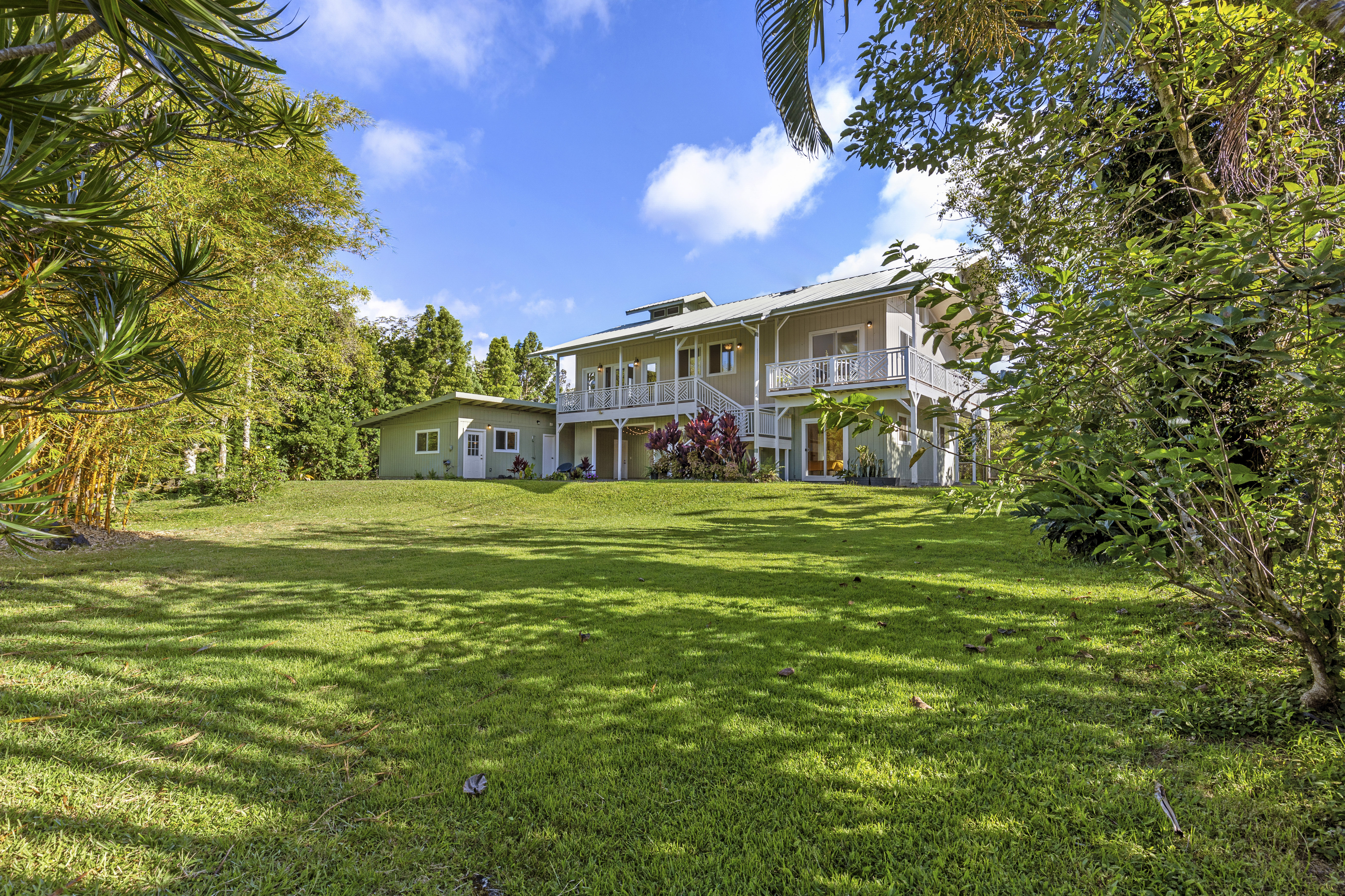 a view of a house with a big yard