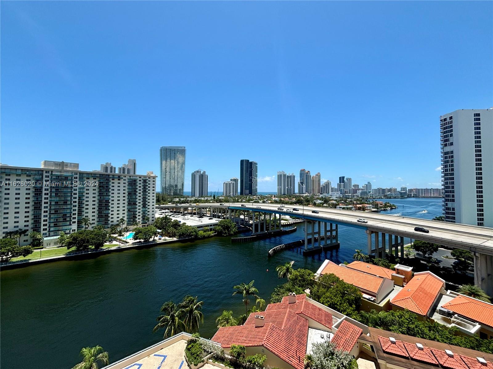 a view of a city with tall buildings