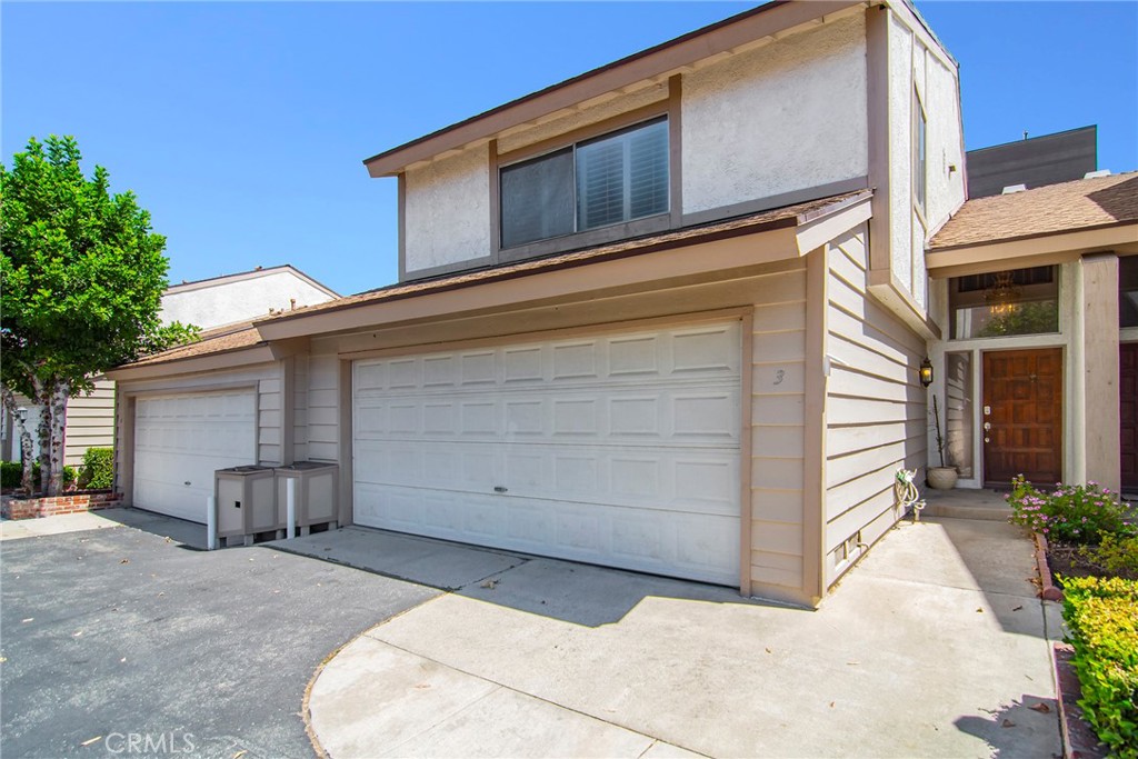 a view of a house with a garage