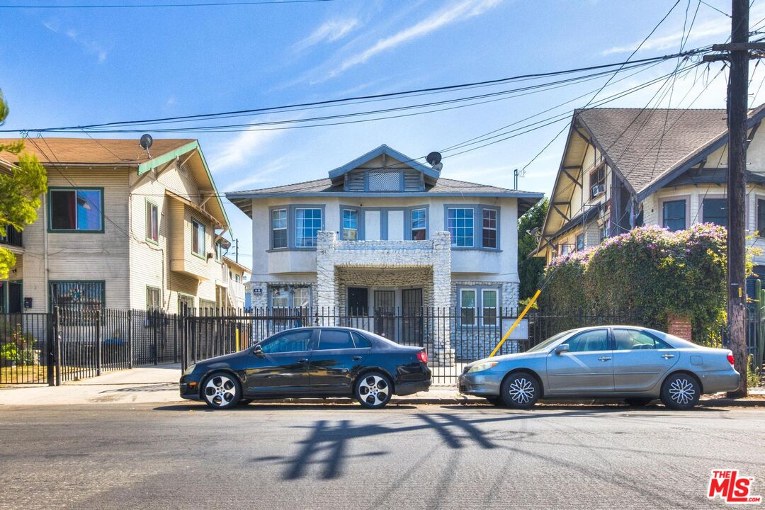 a car parked in front of a house