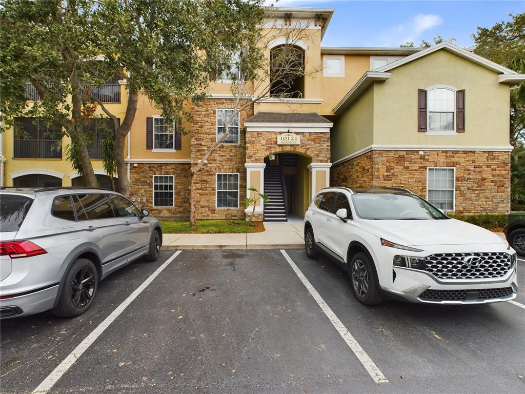 a view of a car in front of a house