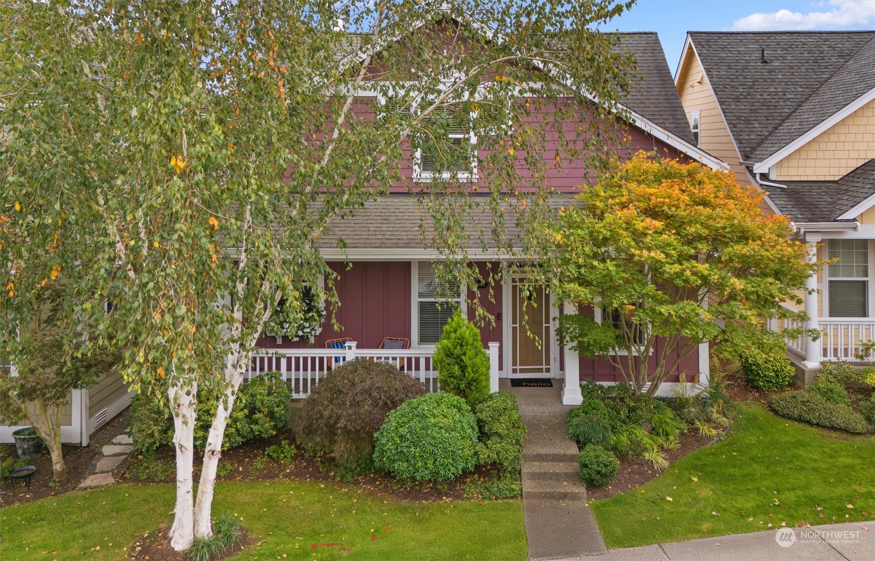 a front view of a house with garden