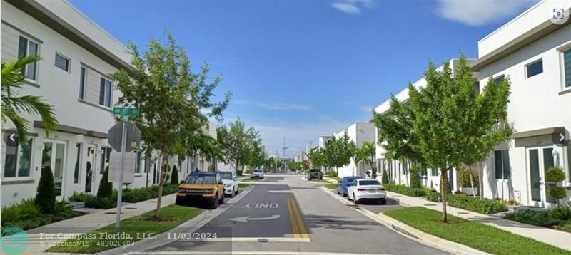 a view of a city with tall buildings