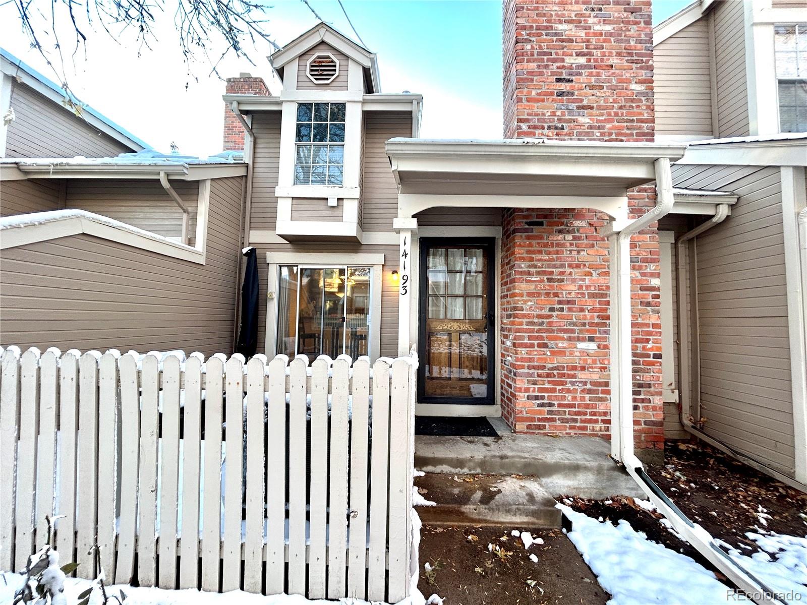 a front view of a house with a porch