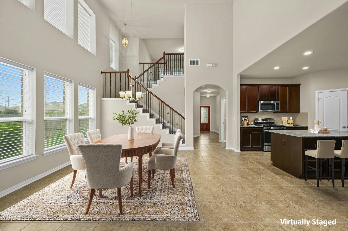 a view of a dining room with furniture