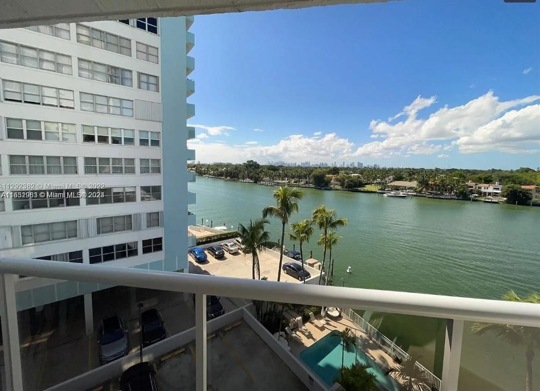 a view of a lake from a balcony