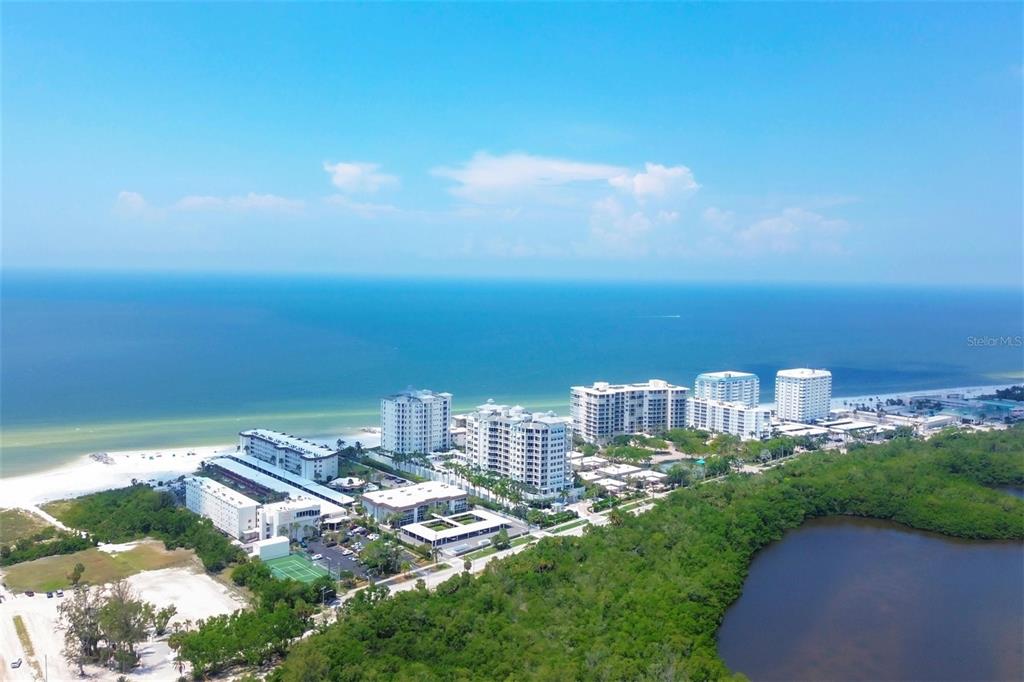 a view of a city with tall buildings in the background