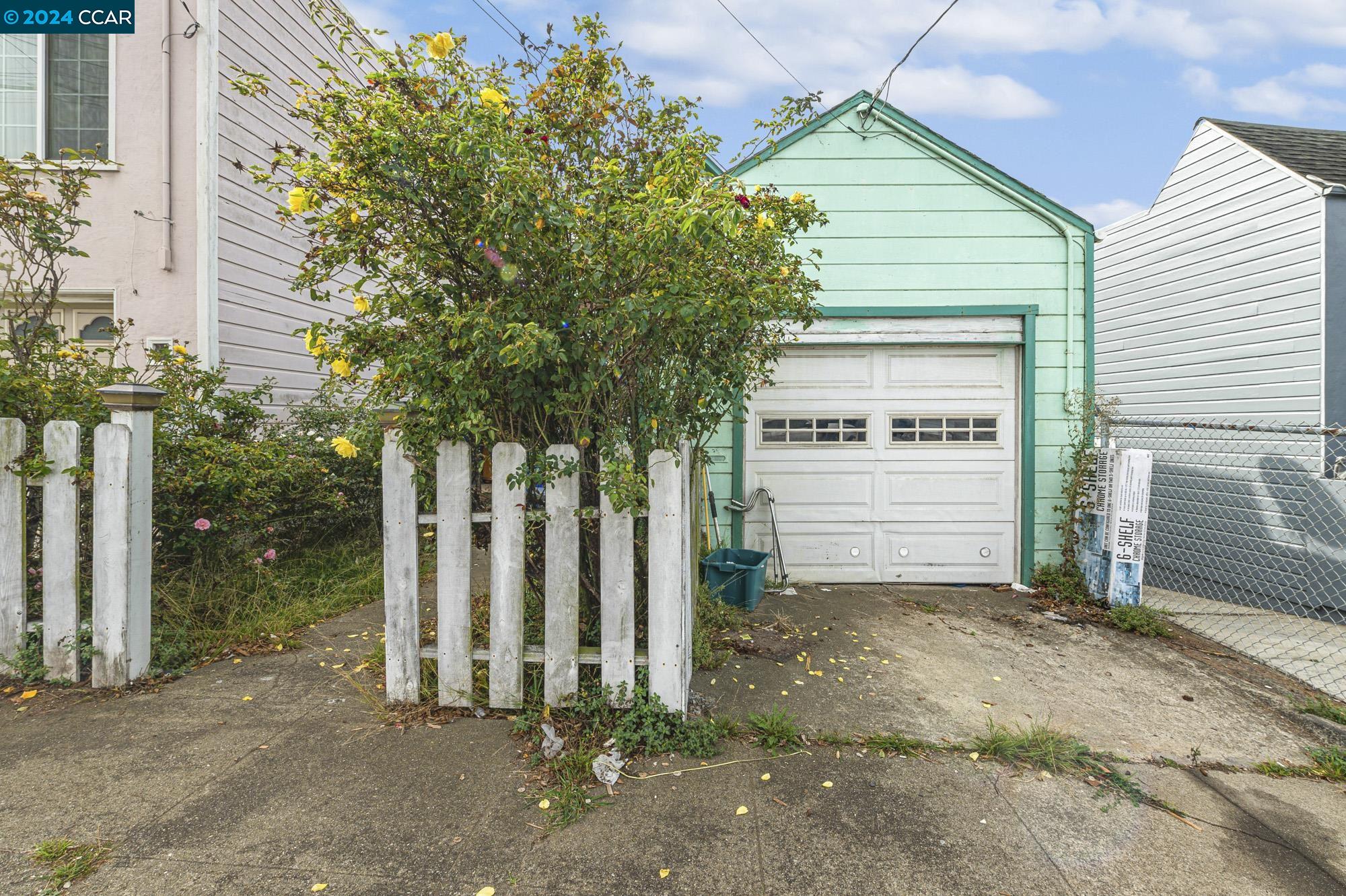 a front view of a house with a garage