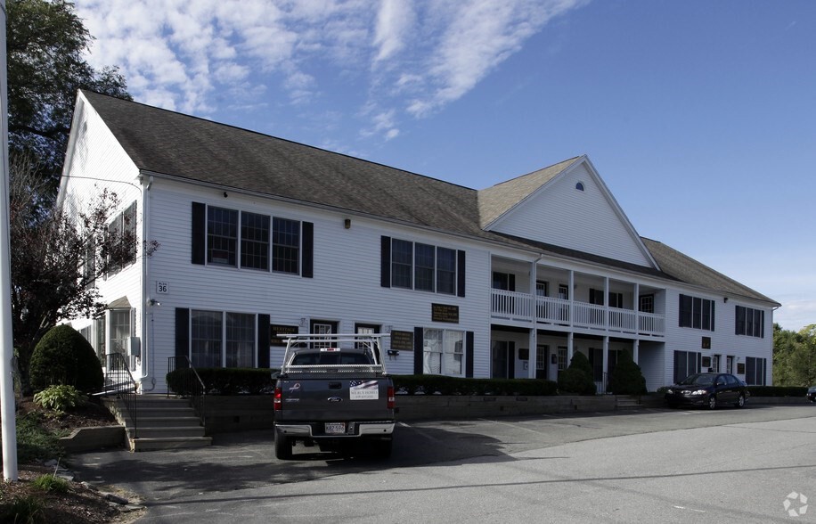 a view of building with yard