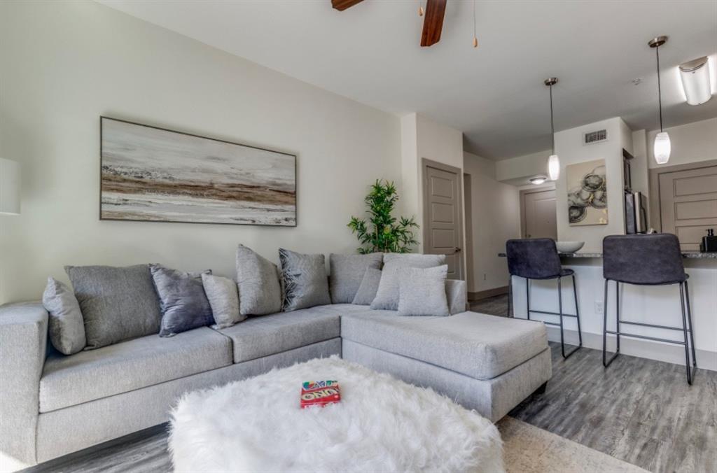 a living room with furniture and a couch