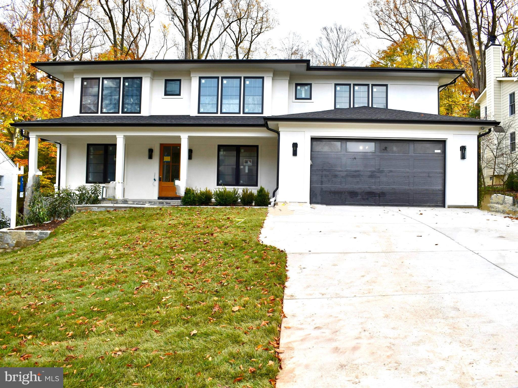 a front view of a house with yard