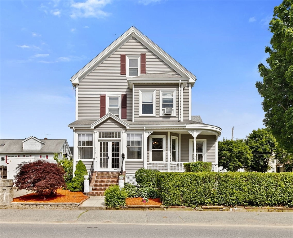 a front view of a house with a yard