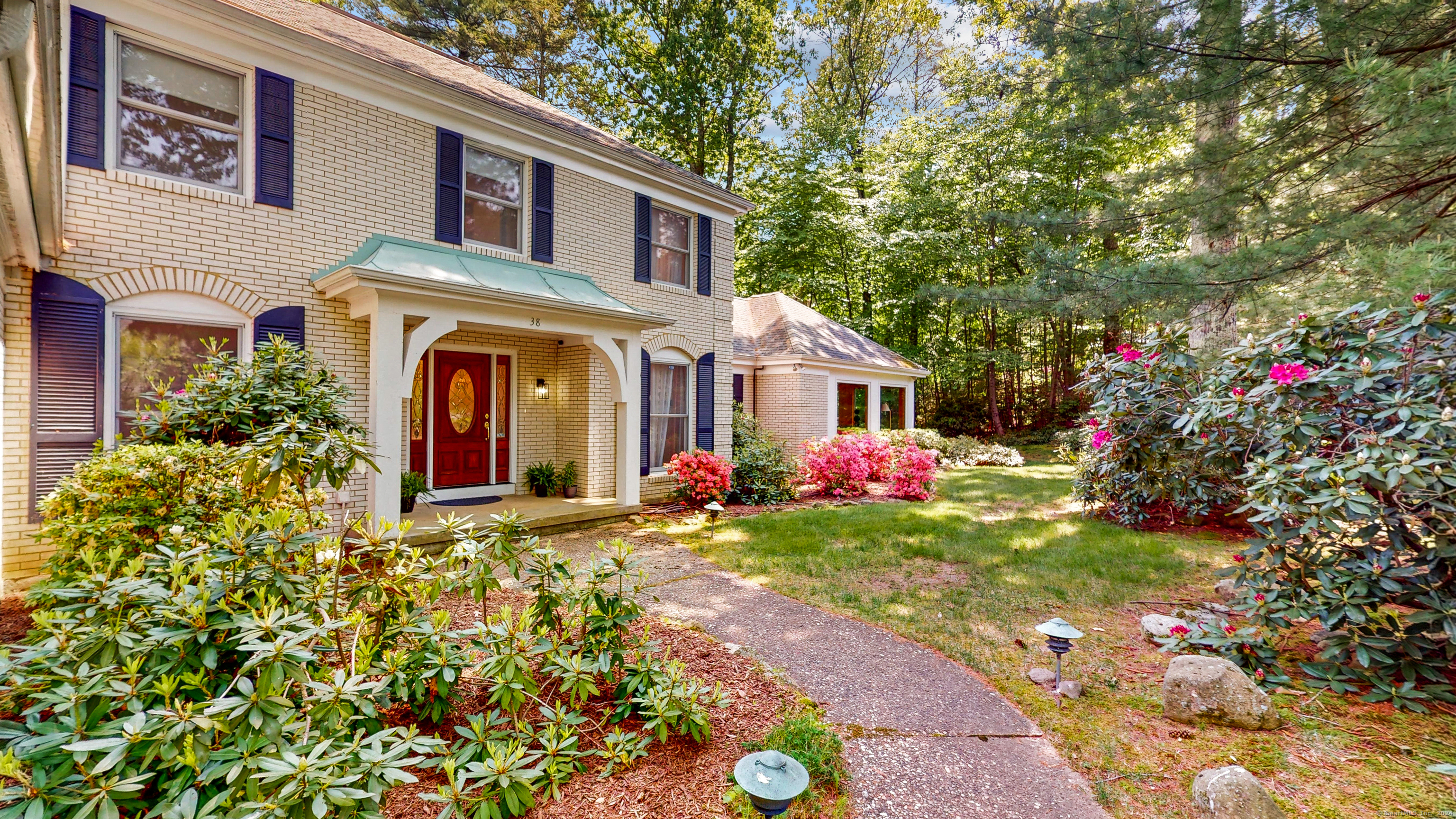 Welcome to 38 Wyngate Drive. This gracious white brick colonial is located in a serene & private setting in a sought after neighborhood in lovely Avon, CT.