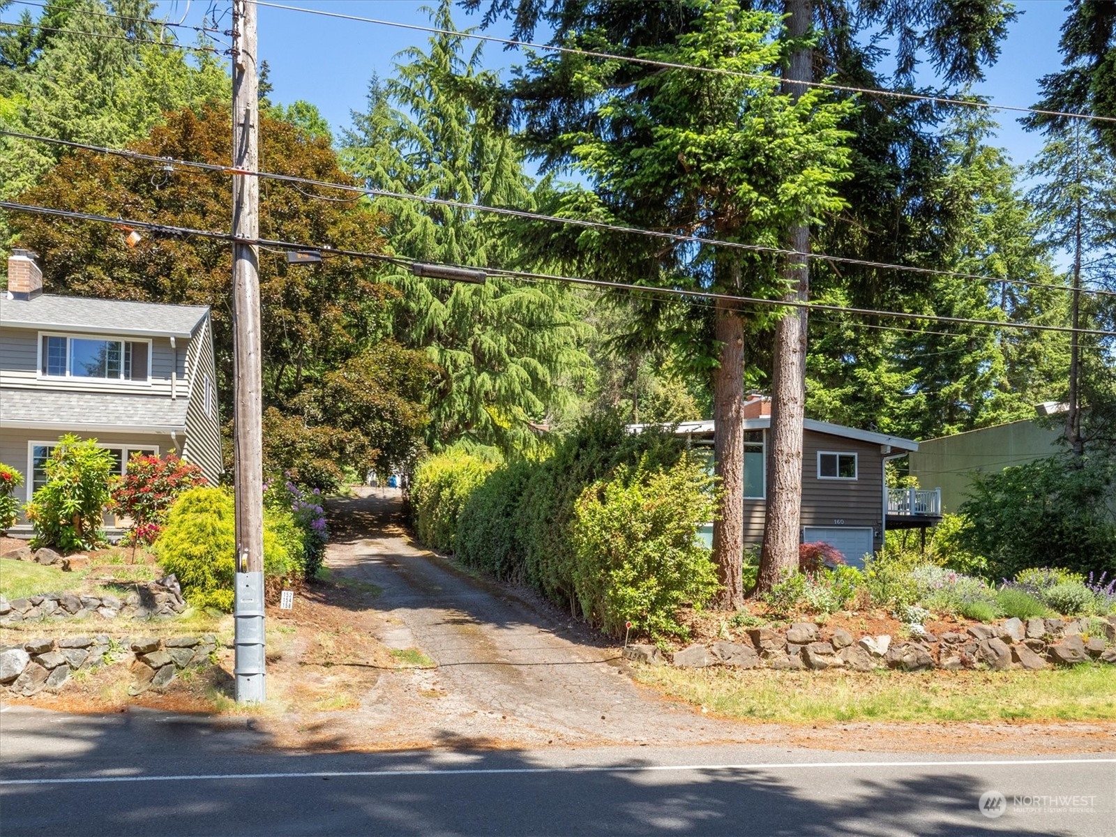 a backyard of a house with lots of green space