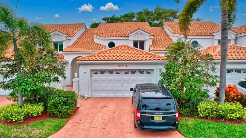 a car parked in front of a house