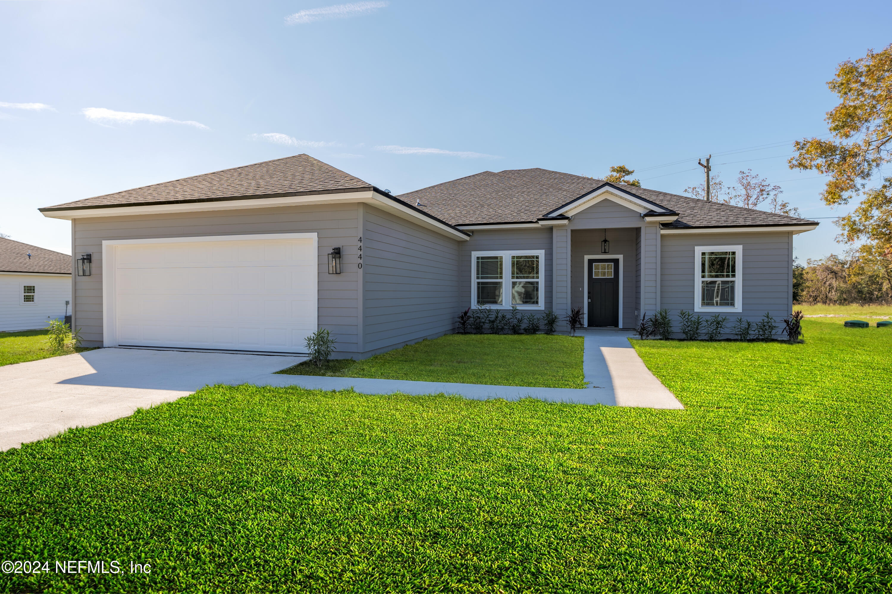 a view of outdoor space yard and garage