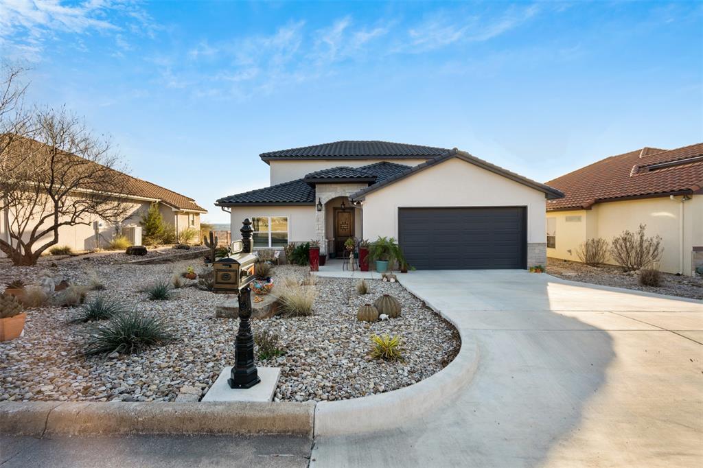 a front view of a house with entertaining space