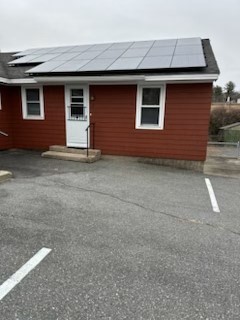 a front view of a house with garage