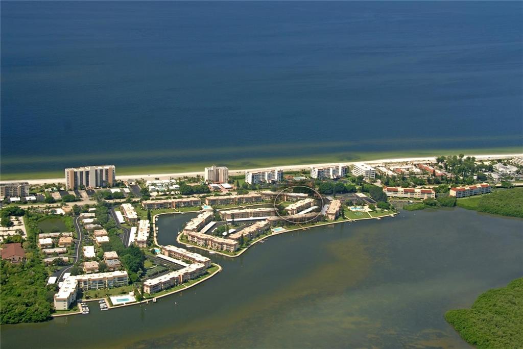 a view of a balcony with an ocean