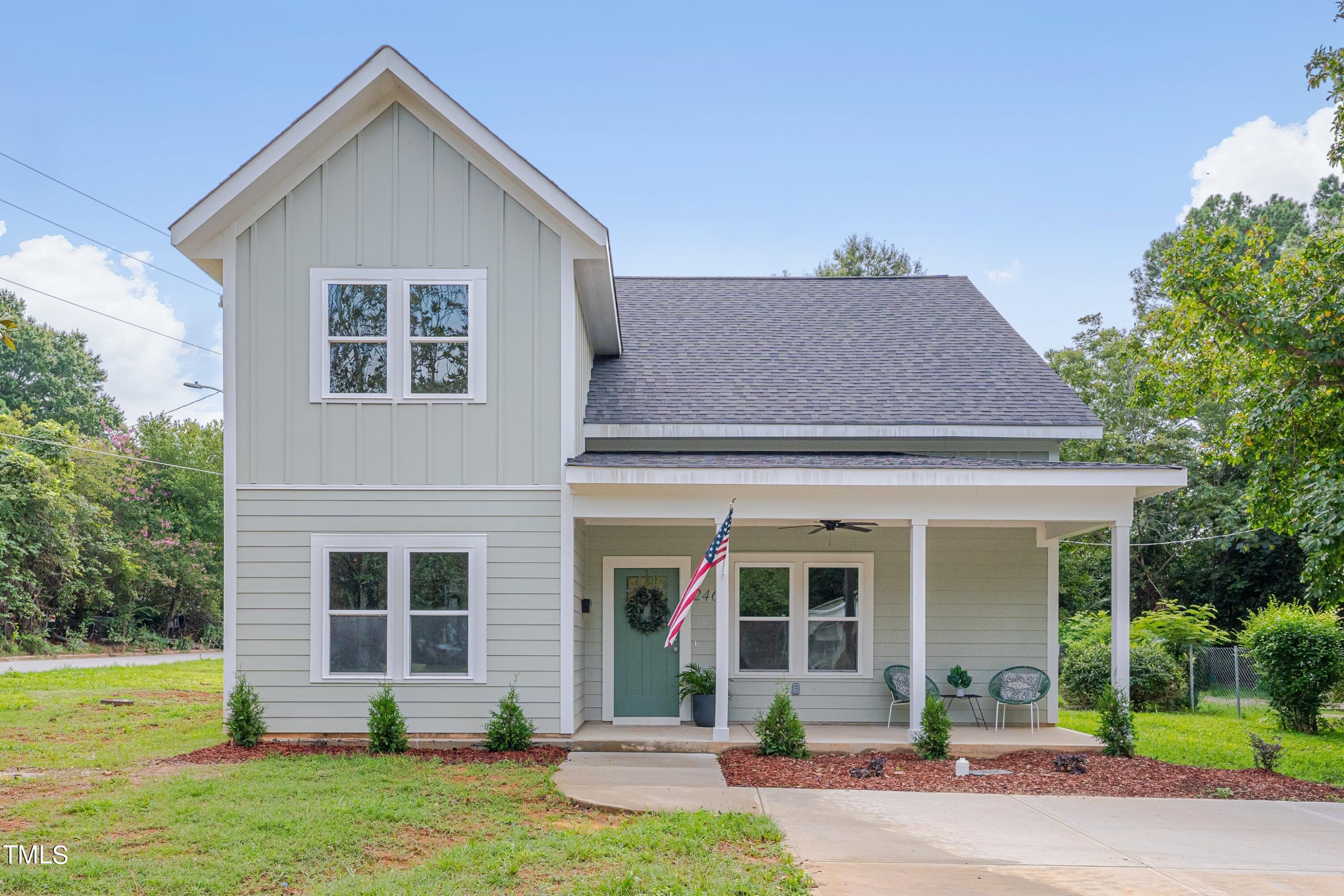 front view of a house with a yard