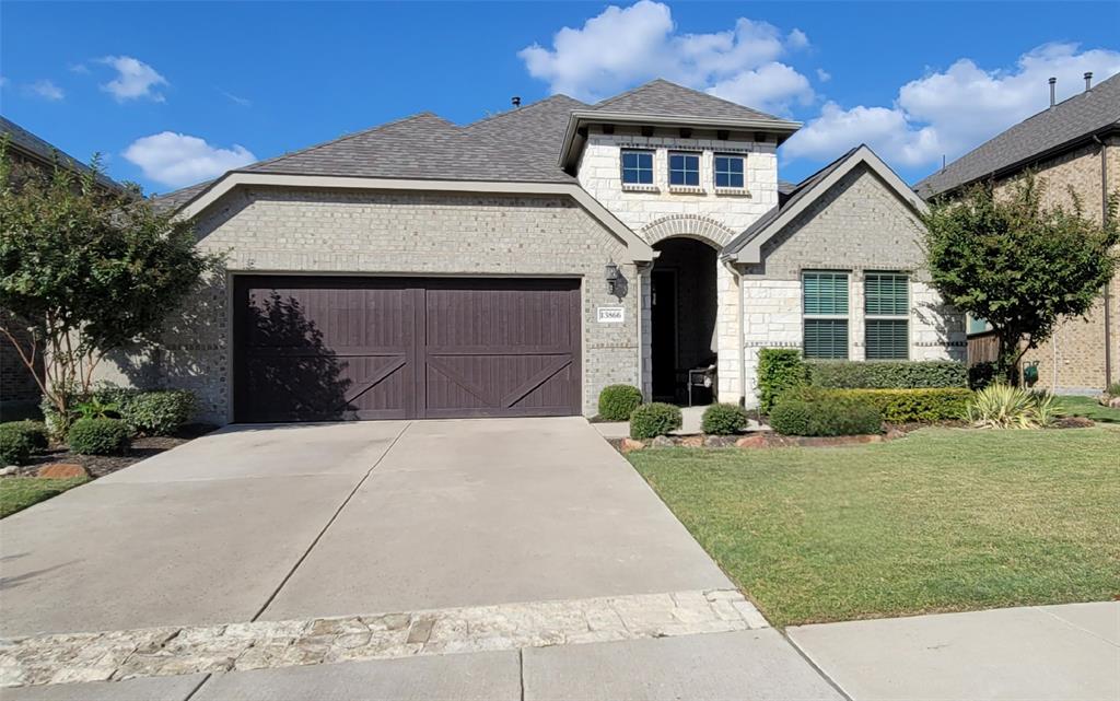 front view of a house and a yard