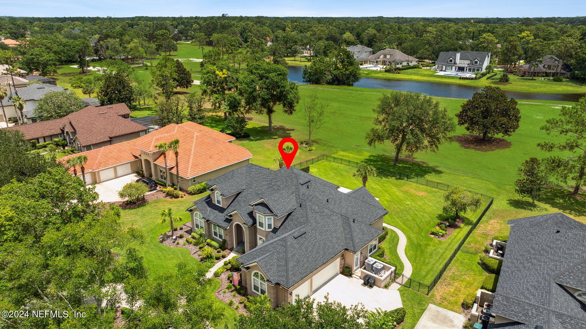 an aerial view of a house with a garden