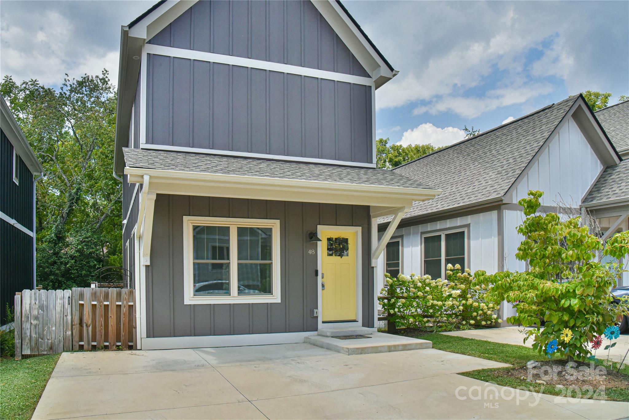 a front view of a house having yard