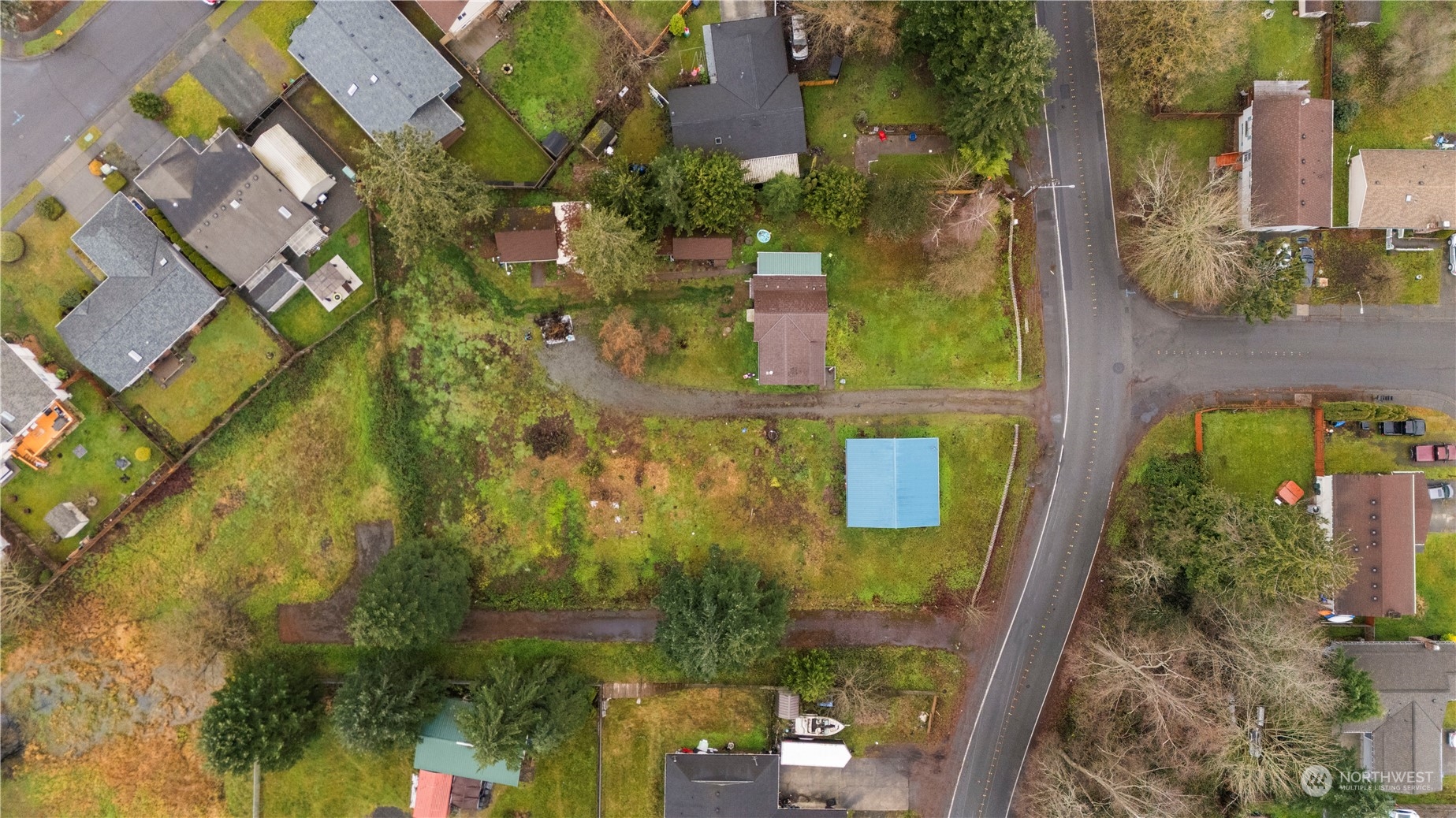 aerial view of residential houses with outdoor space