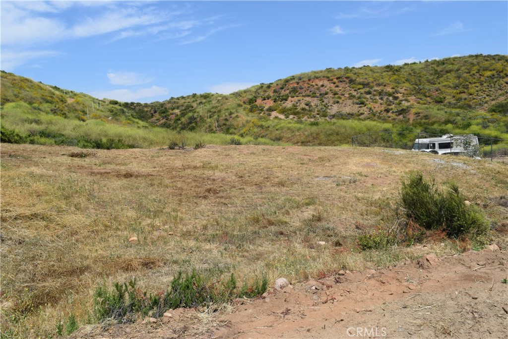 a view of a mountain with an outdoor space