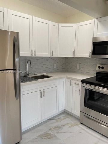 $1,695 | 1400 Southwest 124th Terrace, Unit 405Q | Century Village