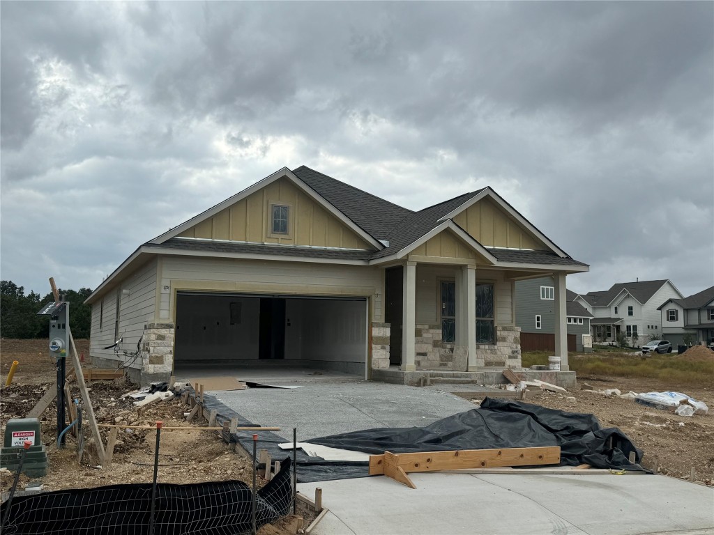 a front view of a house with yard