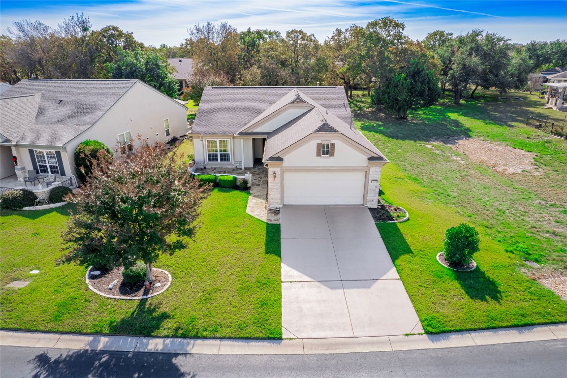 a aerial view of a house with garden