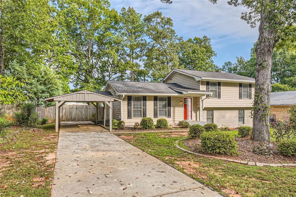 front view of a house with a yard