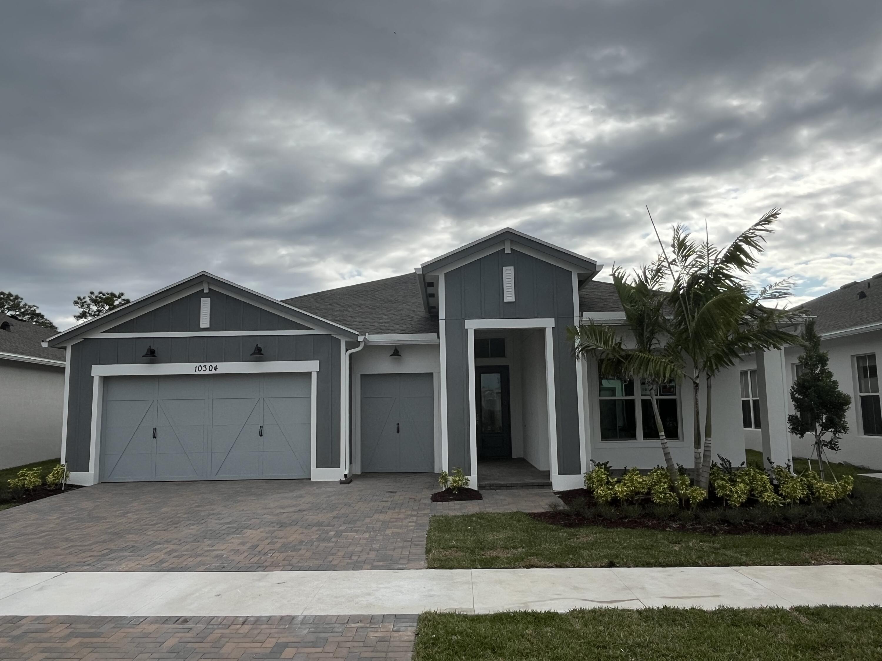 front view of a house with a garage