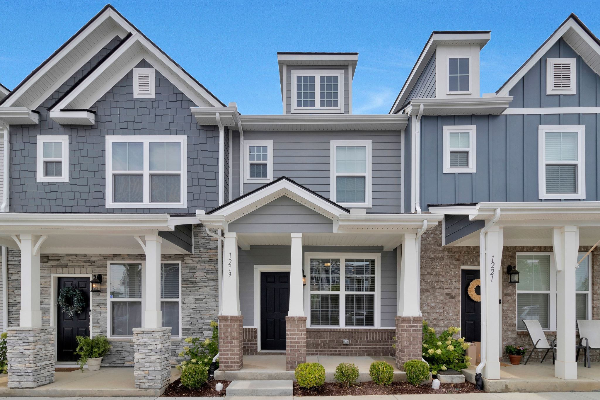 front view of a house with a yard