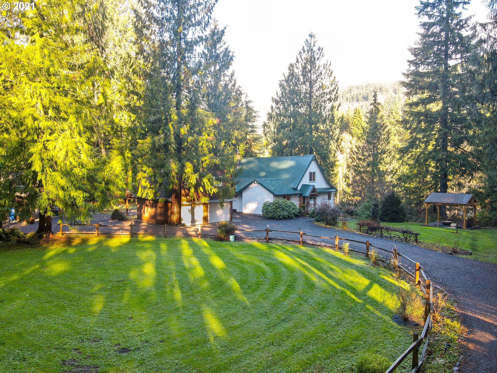 a view of a house with a big yard