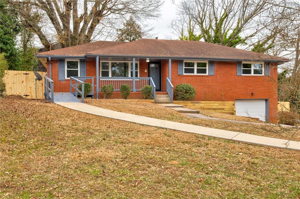 a front view of a house with a patio