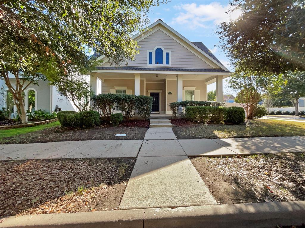 a view of a yard in front of a house