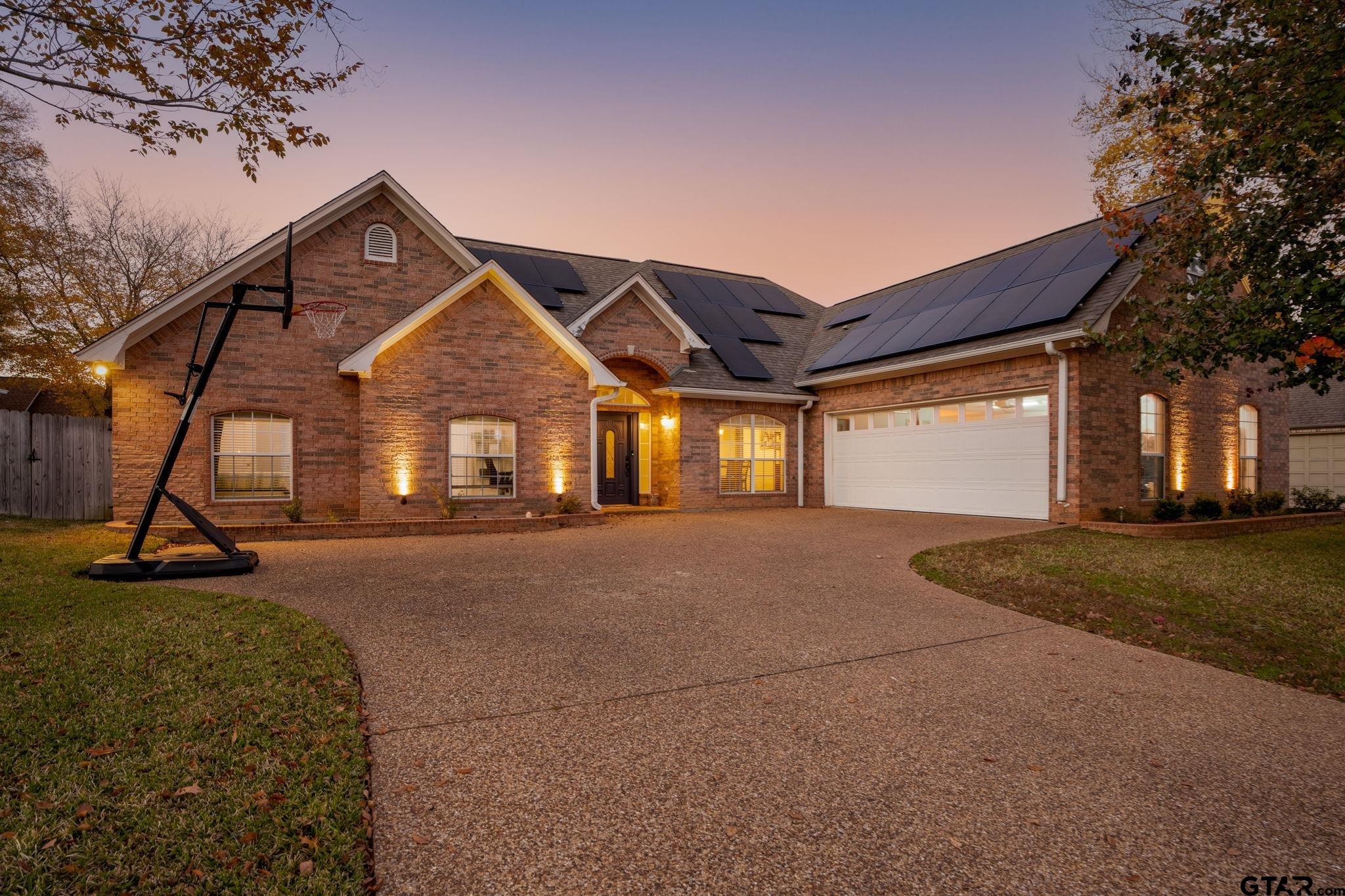 a view of house with yard