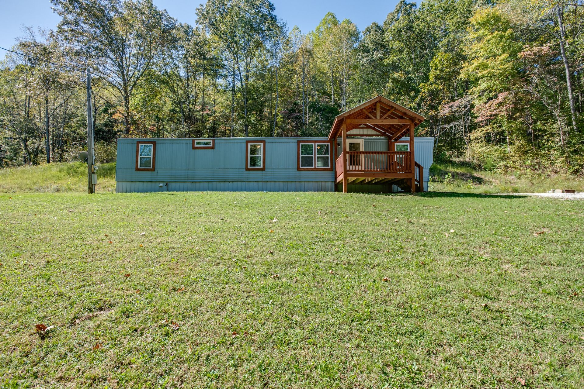 a house with trees in the background